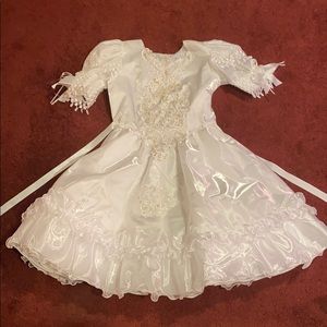 White formal lace, sequins, and bow dress